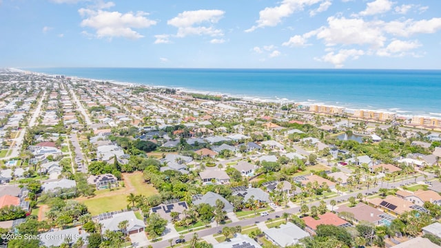 bird's eye view with a residential view and a water view