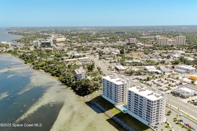 view of urban area with a nearby body of water