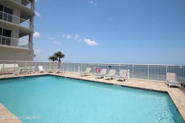 community pool with a patio