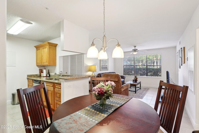 7667 N Wickham Rd Unit 208, Melbourne, FL 32940 - dining area with baseboards, light tile patterned floors, and ceiling fan with notable chandelier
