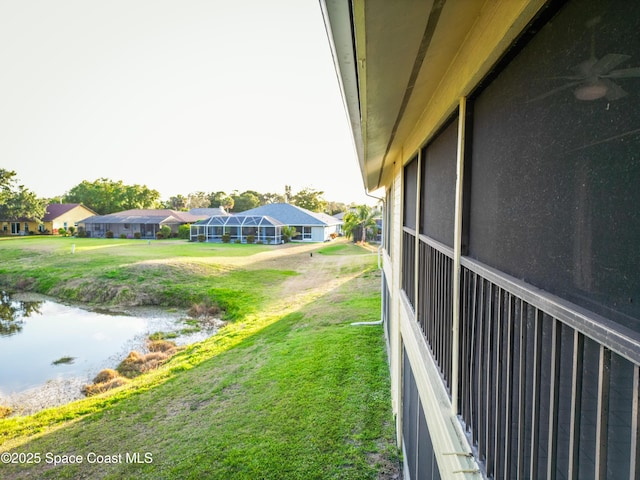 3564 Muirfield Dr Unit 4, Titusville, FL 32780 - view of grassy yard with a residential view and a water view