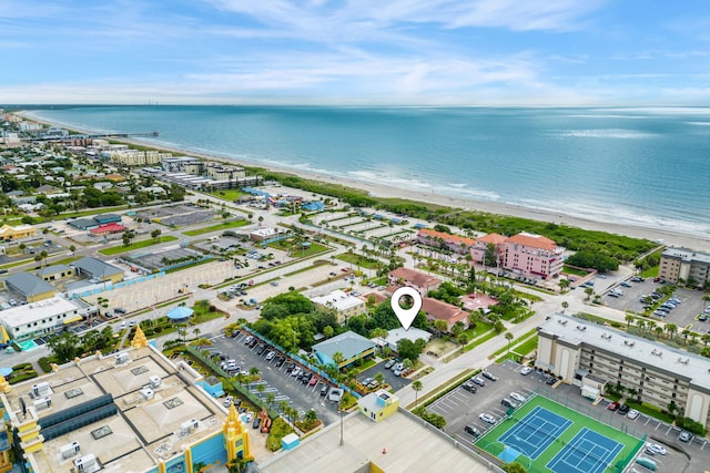 aerial view featuring a water view and a beach view