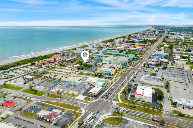 aerial view featuring a water view and a view of the beach