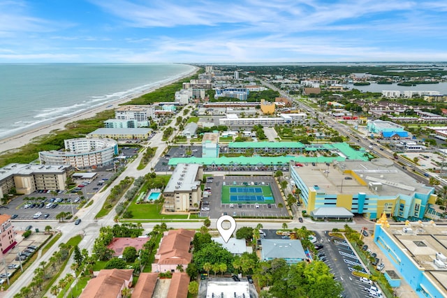 bird's eye view with a water view and a view of the beach