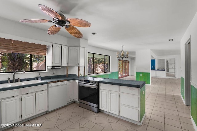 kitchen with stainless steel range with electric cooktop, a sink, dishwasher, a peninsula, and white cabinetry