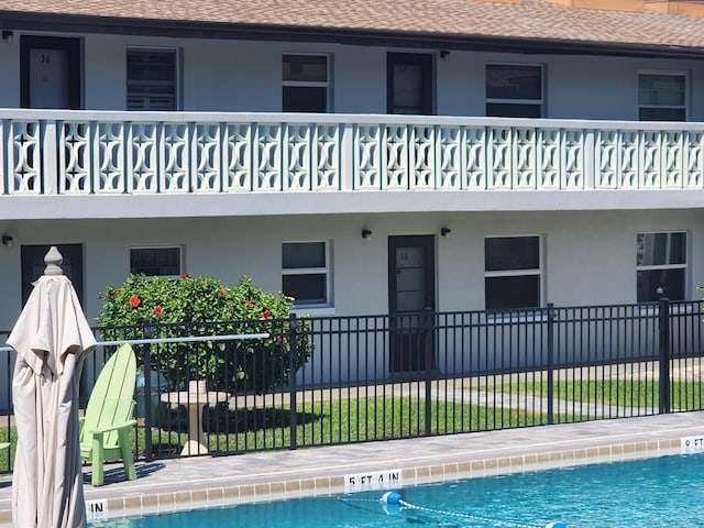 community pool with fence