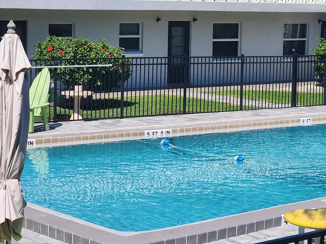 pool featuring fence