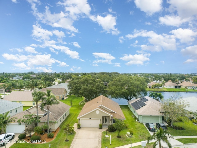 3873 San Miguel Ln, Rockledge, FL 32955 - aerial perspective of suburban area with a large body of water