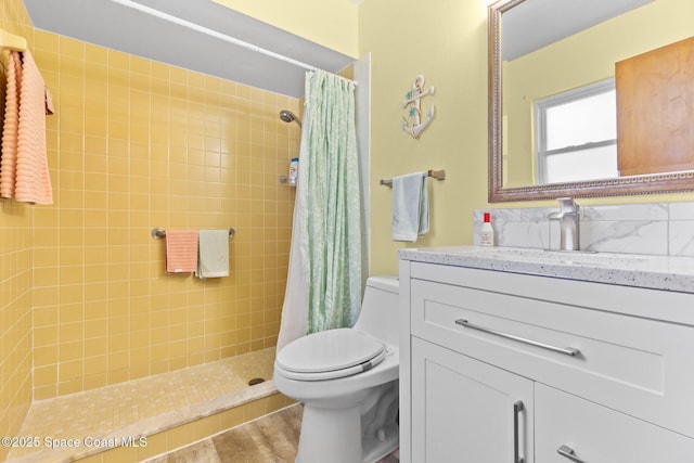 550 E Merrimac Dr, Merritt Island, FL 32952 - full bath with toilet, tiled shower, and vanity