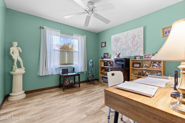 550 E Merrimac Dr, Merritt Island, FL 32952 - office area with ceiling fan, baseboards, and wood finished floors