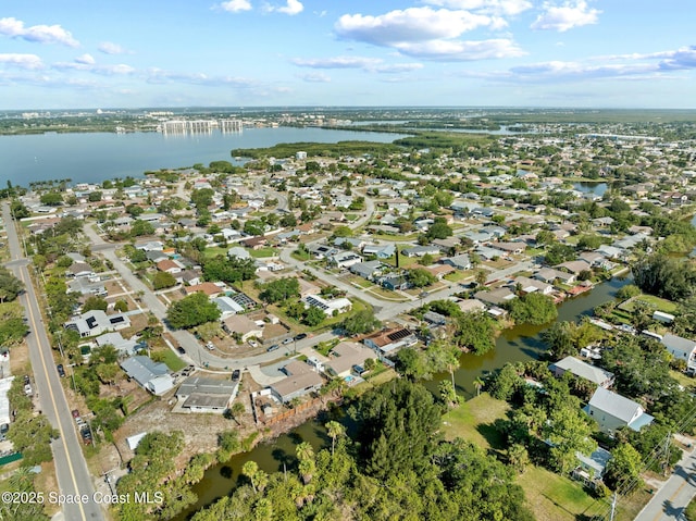 550 E Merrimac Dr, Merritt Island, FL 32952 - drone / aerial view featuring a water view and a residential view
