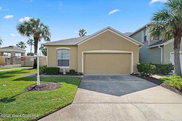 view of front facade with concrete driveway, stucco siding, a garage, and a front lawn