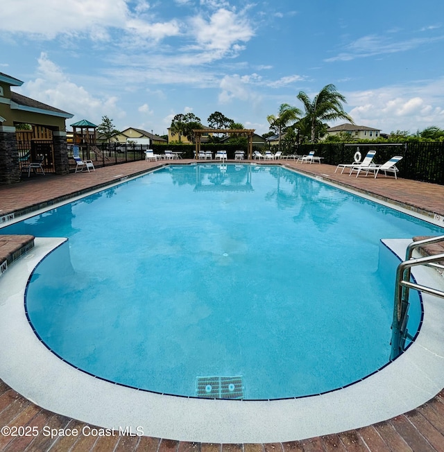 pool featuring fence