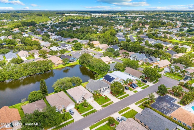 1050 Olde Bailey Ln, Melbourne, FL 32904 - aerial perspective of suburban area featuring a nearby body of water