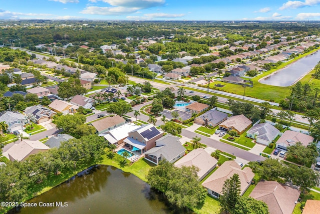 1050 Olde Bailey Ln, Melbourne, FL 32904 - aerial perspective of suburban area with a nearby body of water