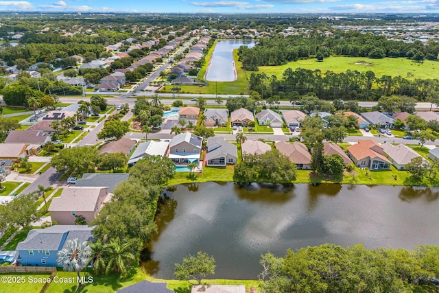 1050 Olde Bailey Ln, Melbourne, FL 32904 - aerial perspective of suburban area with a large body of water