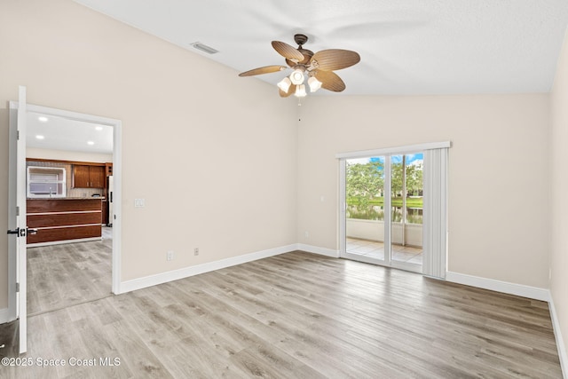 1050 Olde Bailey Ln, Melbourne, FL 32904 - unfurnished room with lofted ceiling, baseboards, light wood-type flooring, a ceiling fan, and recessed lighting