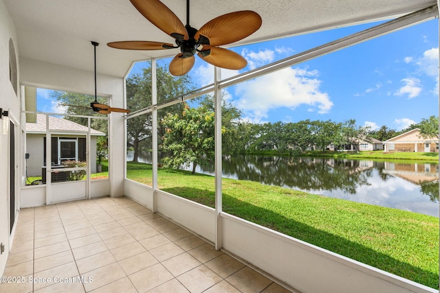 1050 Olde Bailey Ln, Melbourne, FL 32904 - unfurnished sunroom featuring a water view and a ceiling fan