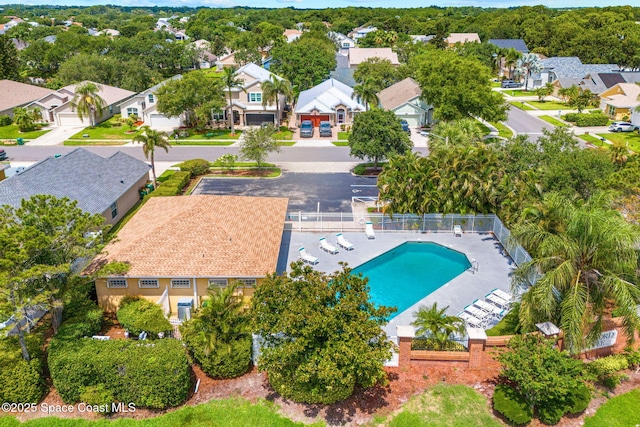 1050 Olde Bailey Ln, Melbourne, FL 32904 - aerial perspective of suburban area with a pool area