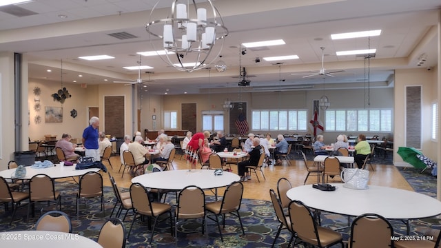 dining room with visible vents and a ceiling fan