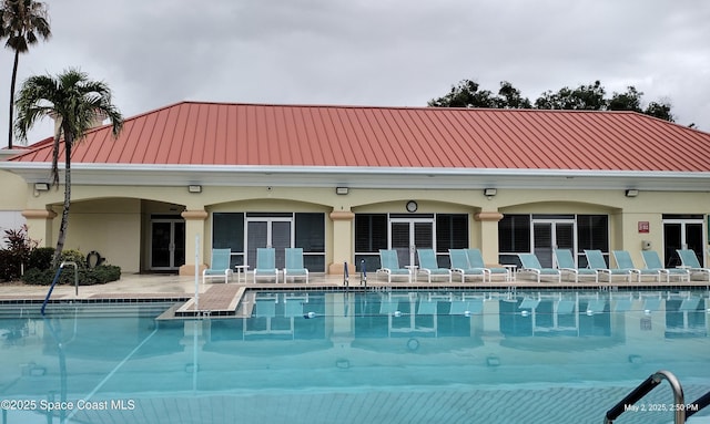 pool featuring a patio
