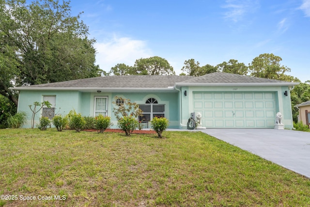 1367 Wing Rd SW, Palm Bay, FL 32908 - single story home featuring a garage, concrete driveway, stucco siding, and a front yard