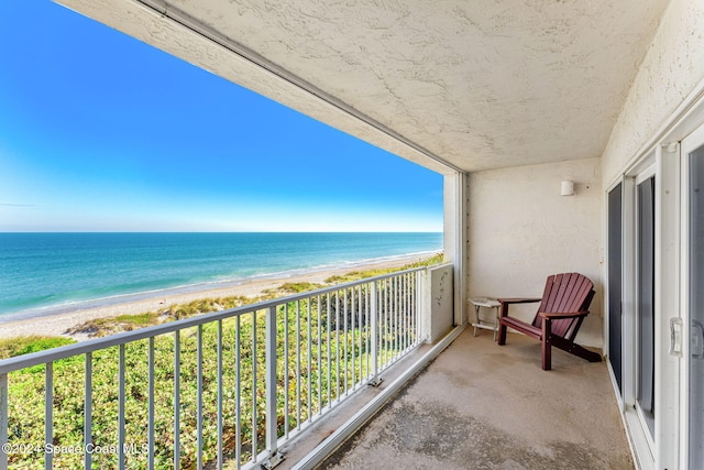 2207 Atlantic St Unit 825, Melbourne Beach, FL 32951 - balcony with a water view and a view of the beach