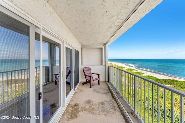 2207 Atlantic St Unit 825, Melbourne Beach, FL 32951 - balcony with a view of the beach and a water view
