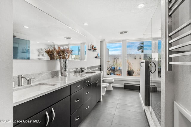 2207 Atlantic St Unit 825, Melbourne Beach, FL 32951 - full bathroom featuring a sink, radiator, visible vents, and a bidet