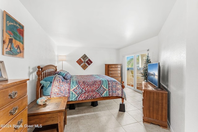 2207 Atlantic St Unit 825, Melbourne Beach, FL 32951 - bedroom featuring light tile patterned floors and access to outside