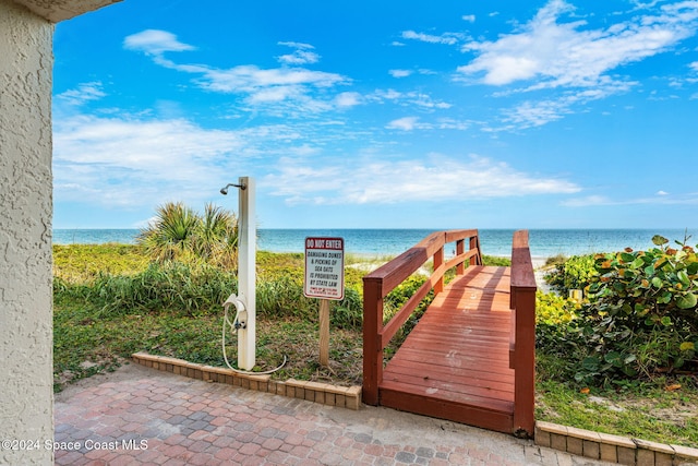 2207 Atlantic St Unit 825, Melbourne Beach, FL 32951 - view of home's community featuring a water view and a beach view