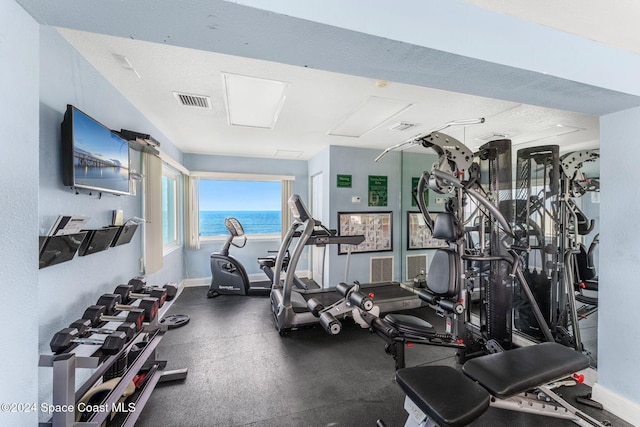 2207 Atlantic St Unit 825, Melbourne Beach, FL 32951 - gym with baseboards and visible vents