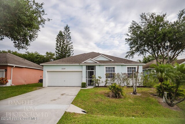 1110 8th Pl, Vero Beach, FL 32960 - ranch-style house featuring concrete driveway, a front yard, stucco siding, and a garage