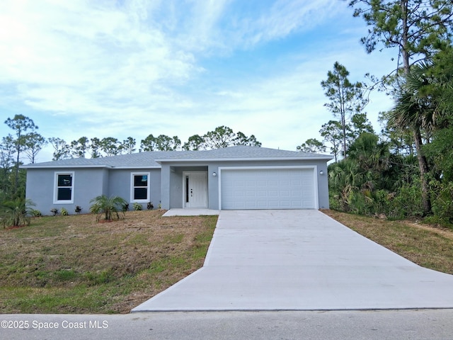 ranch-style home with an attached garage, stucco siding, driveway, and a front yard