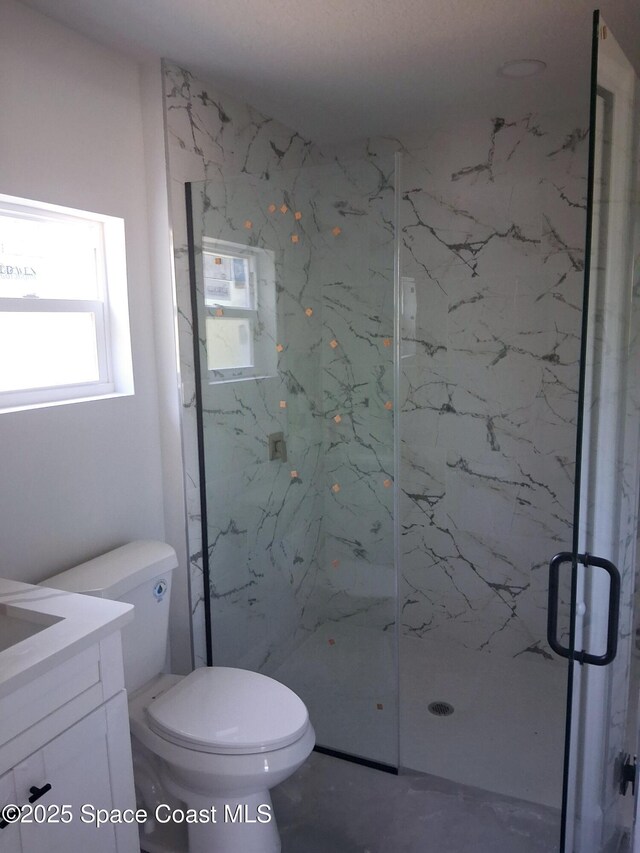 411 La Coco St SW, Palm Bay, FL 32908 - full bath with a marble finish shower, toilet, and vanity