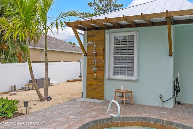 view of patio / terrace with fence