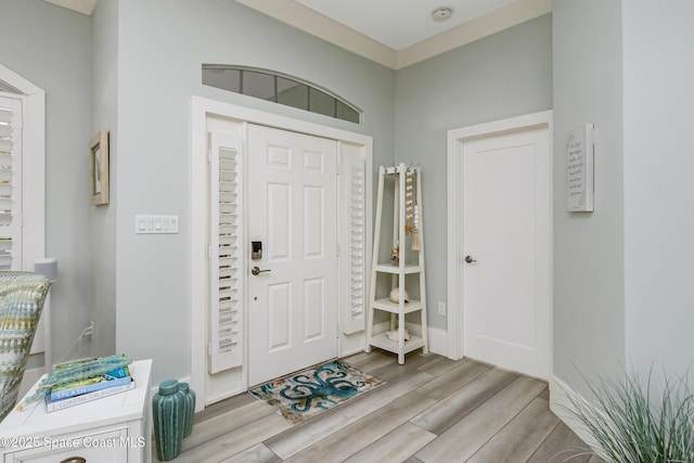 foyer entrance with wood finished floors