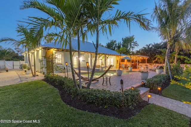 exterior space featuring a patio area and fence