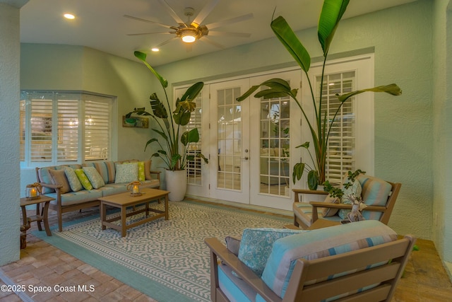 sitting room with a ceiling fan, french doors, and recessed lighting