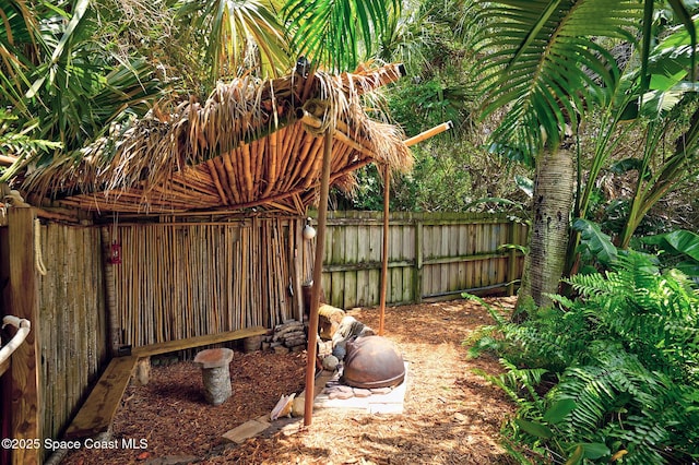 view of yard featuring fence