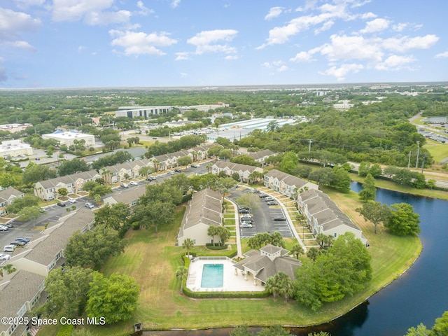 birds eye view of property featuring a water view