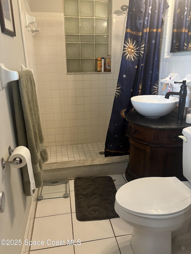 986 Macco Rd, Cocoa, FL 32927 - full bathroom featuring toilet, a stall shower, tile patterned floors, vanity, and tasteful backsplash