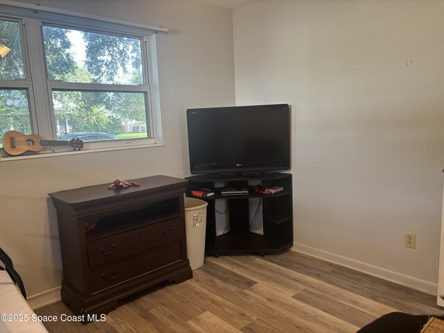 986 Macco Rd, Cocoa, FL 32927 - living area featuring wood finished floors and baseboards