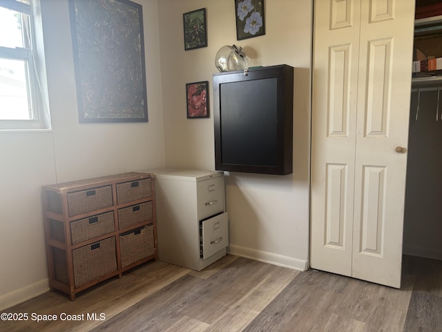 986 Macco Rd, Cocoa, FL 32927 - bathroom featuring wood finished floors and baseboards