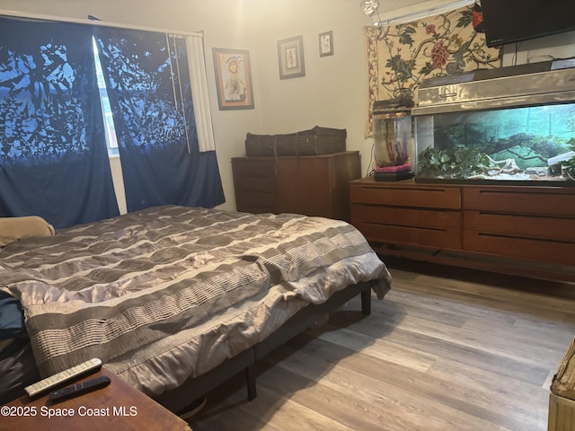 986 Macco Rd, Cocoa, FL 32927 - bedroom featuring wood finished floors