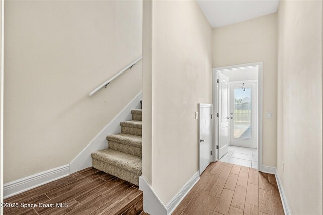 5770 Mascaro Ct, Melbourne, FL 32940 - stairway with wood finish floors and baseboards