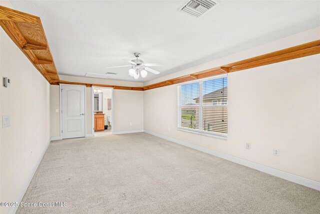5770 Mascaro Ct, Melbourne, FL 32940 - unfurnished room featuring light colored carpet, baseboards, and ceiling fan
