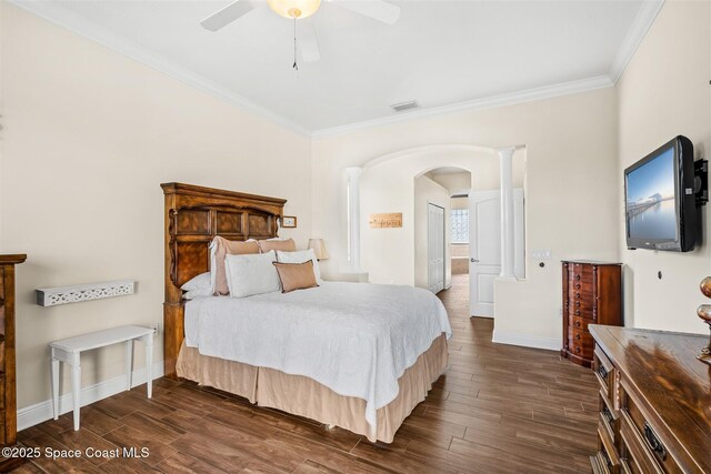 5770 Mascaro Ct, Melbourne, FL 32940 - bedroom featuring ornamental molding, arched walkways, baseboards, dark wood-style flooring, and ceiling fan
