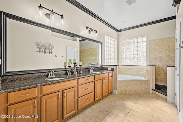 5770 Mascaro Ct, Melbourne, FL 32940 - full bath with crown molding, tile patterned floors, a garden tub, double vanity, and a walk in shower