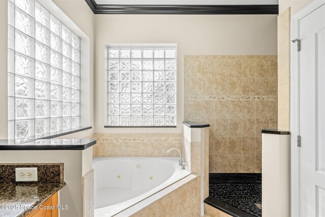 5770 Mascaro Ct, Melbourne, FL 32940 - bathroom featuring a whirlpool tub, a walk in shower, and ornamental molding